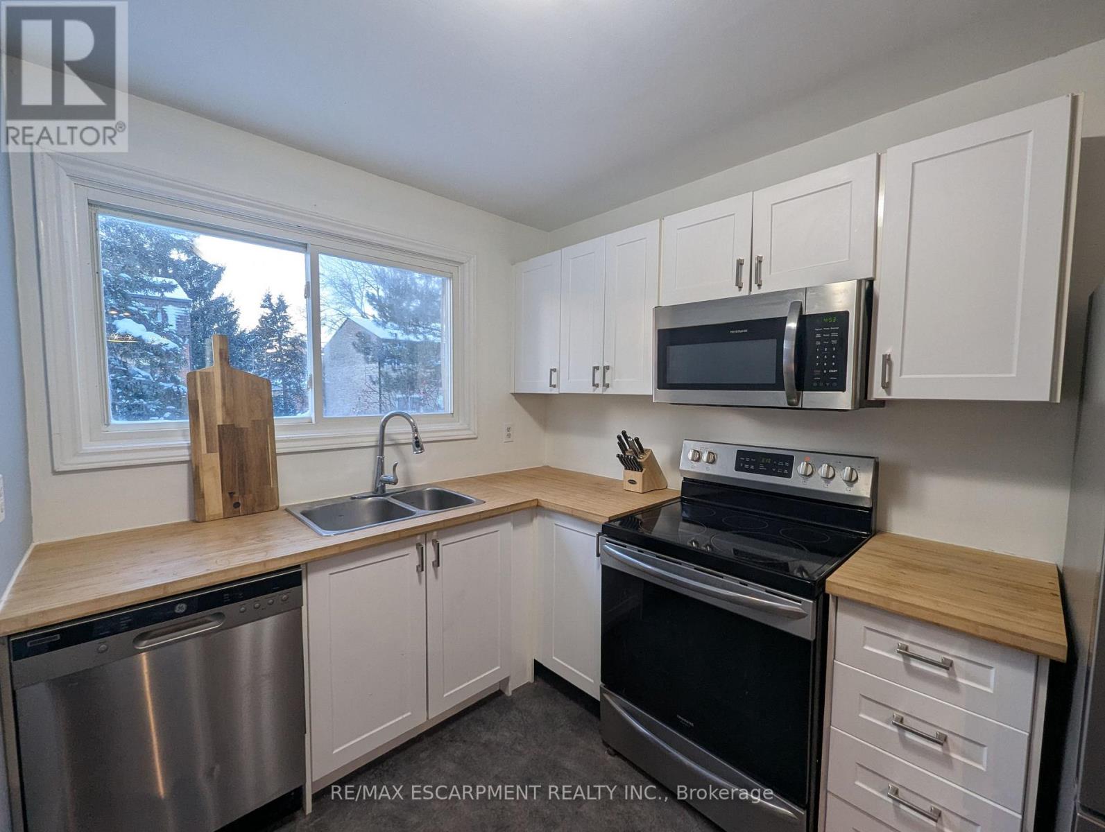 32 - 1440 GARTH STREET Property Photo 1