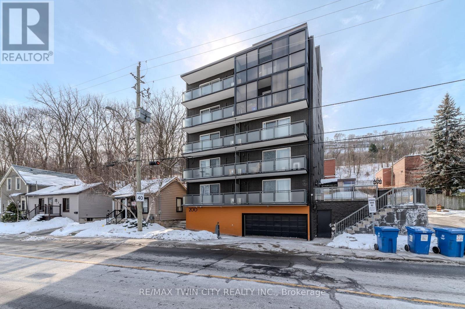 303 - 200 CHARLTON AVENUE E Property Photo 1