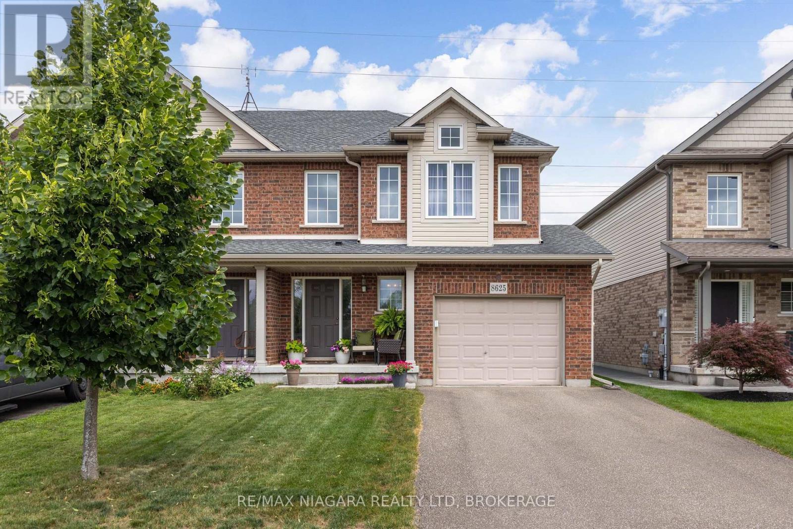 8625 Upper Canada Drive Property Photo 1