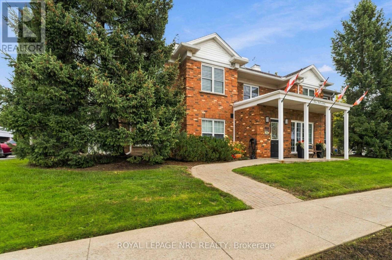 205 - 4090 JOHN CHARLES BOULEVARD Property Photo 1