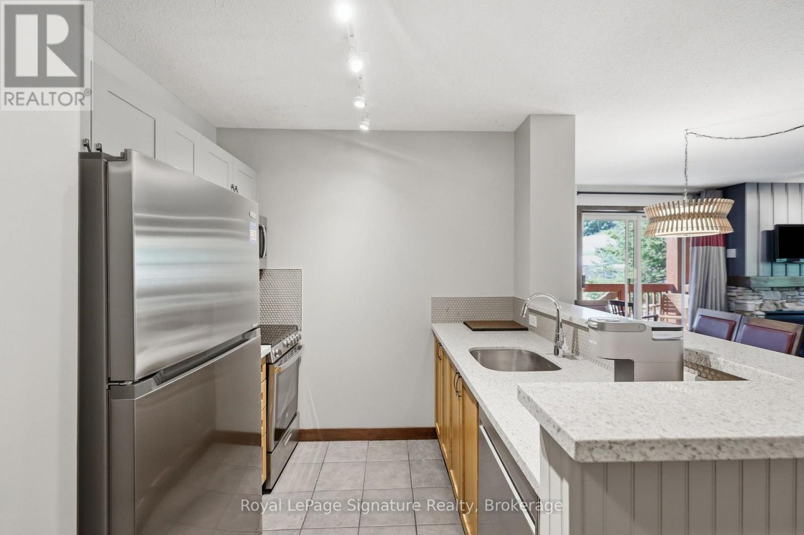 201 - 152 Jozo Weider Boulevard Property Photo 9