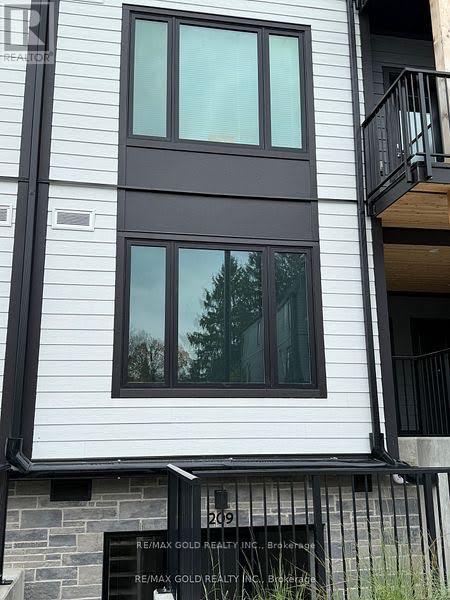 210 - 708 WOOLWICH STREET Property Photo 1