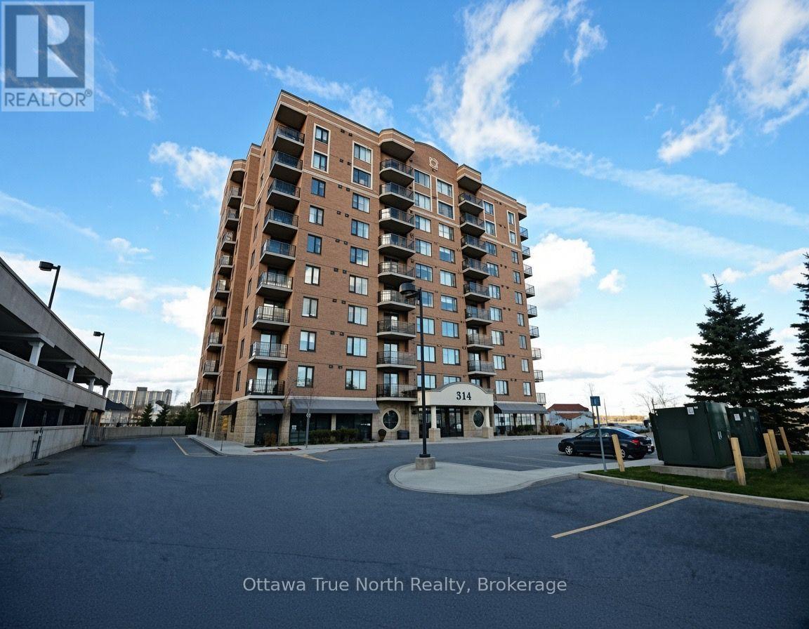 710 - 314 Central Park Drive Photo de la propriété 1