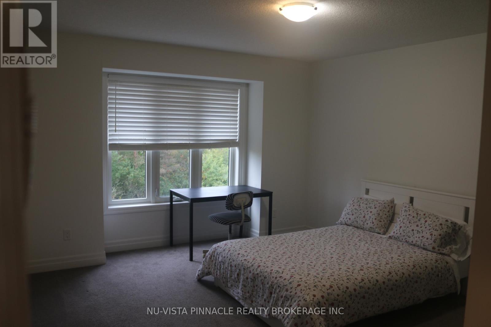 38 - 555 Sunningdale Road E Property Photo 17