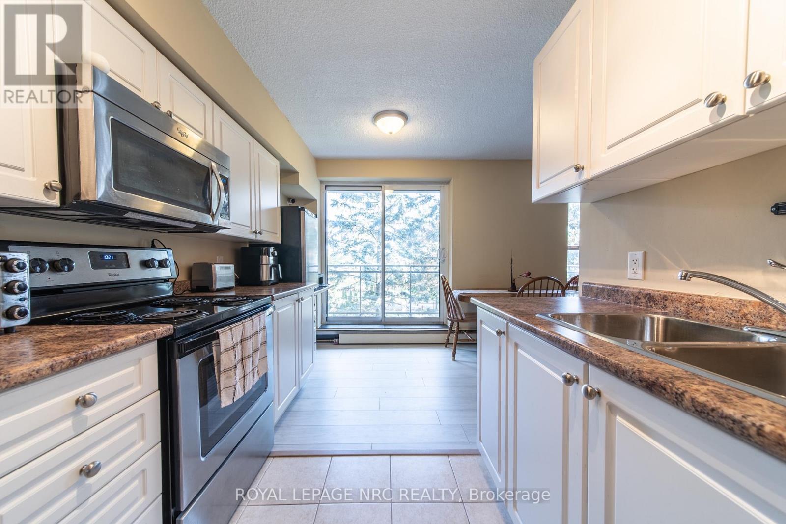 301 - 6400 Huggins Street Property Photo 7