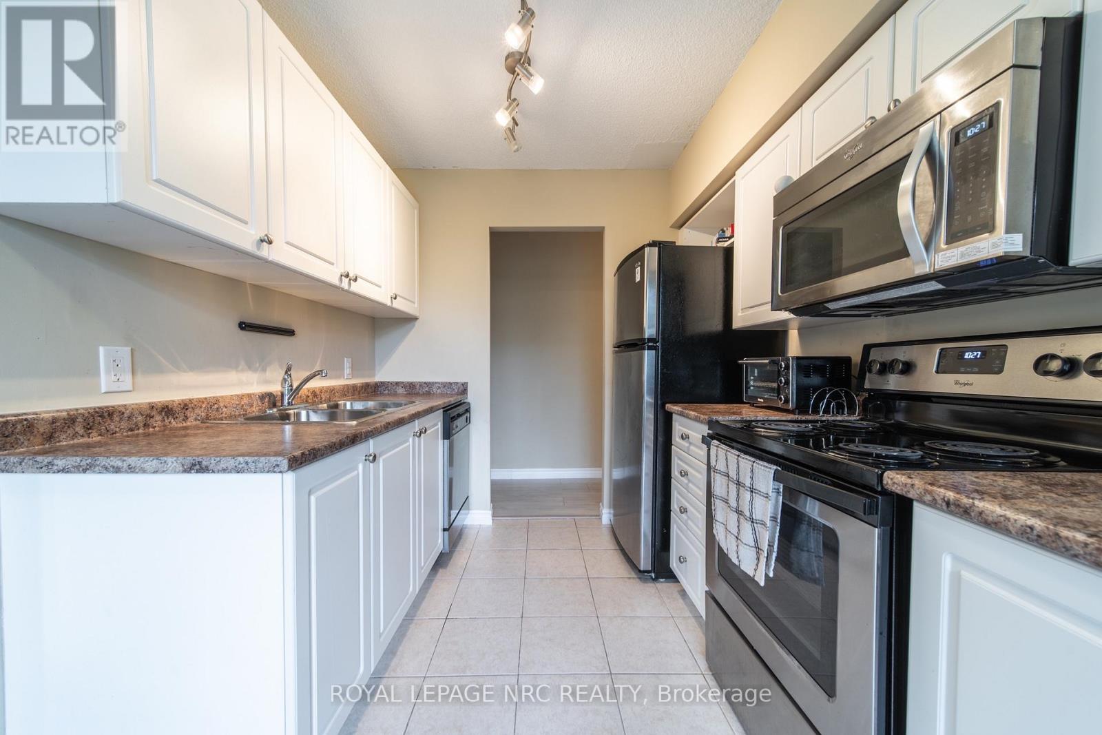 301 - 6400 Huggins Street Property Photo 8