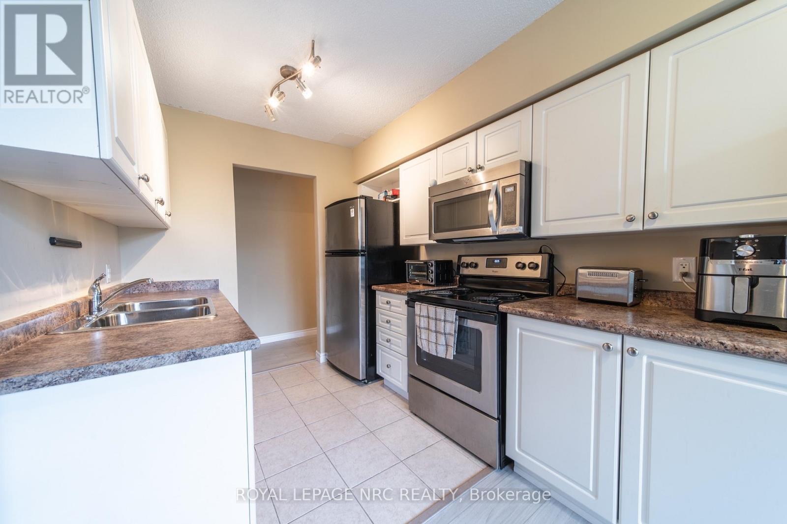 301 - 6400 Huggins Street Property Photo 9