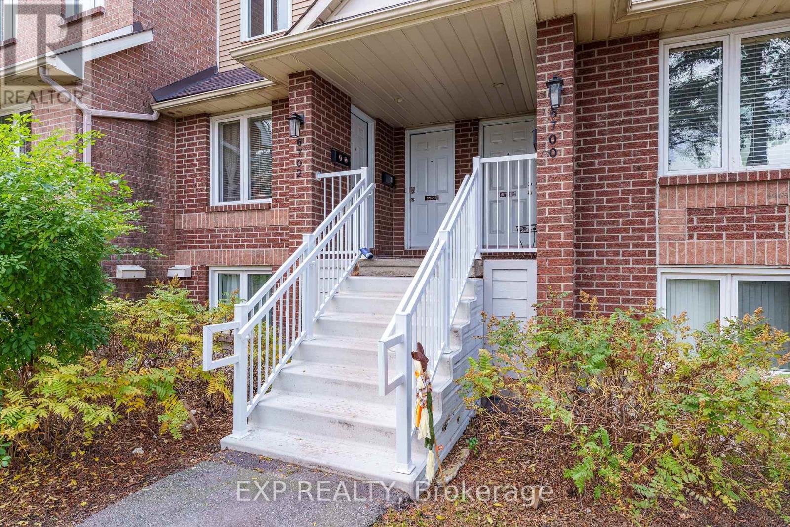 B - 6702 Jeanne D'arc Boulevard N Property Photo 2