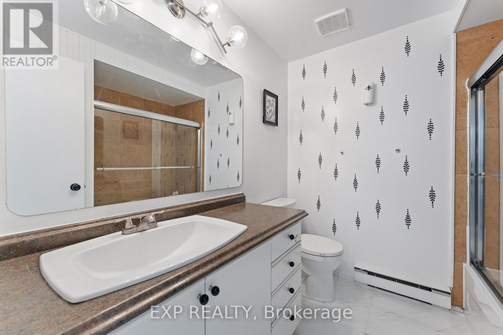 B - 6702 Jeanne D'arc Boulevard N Property Photo 17