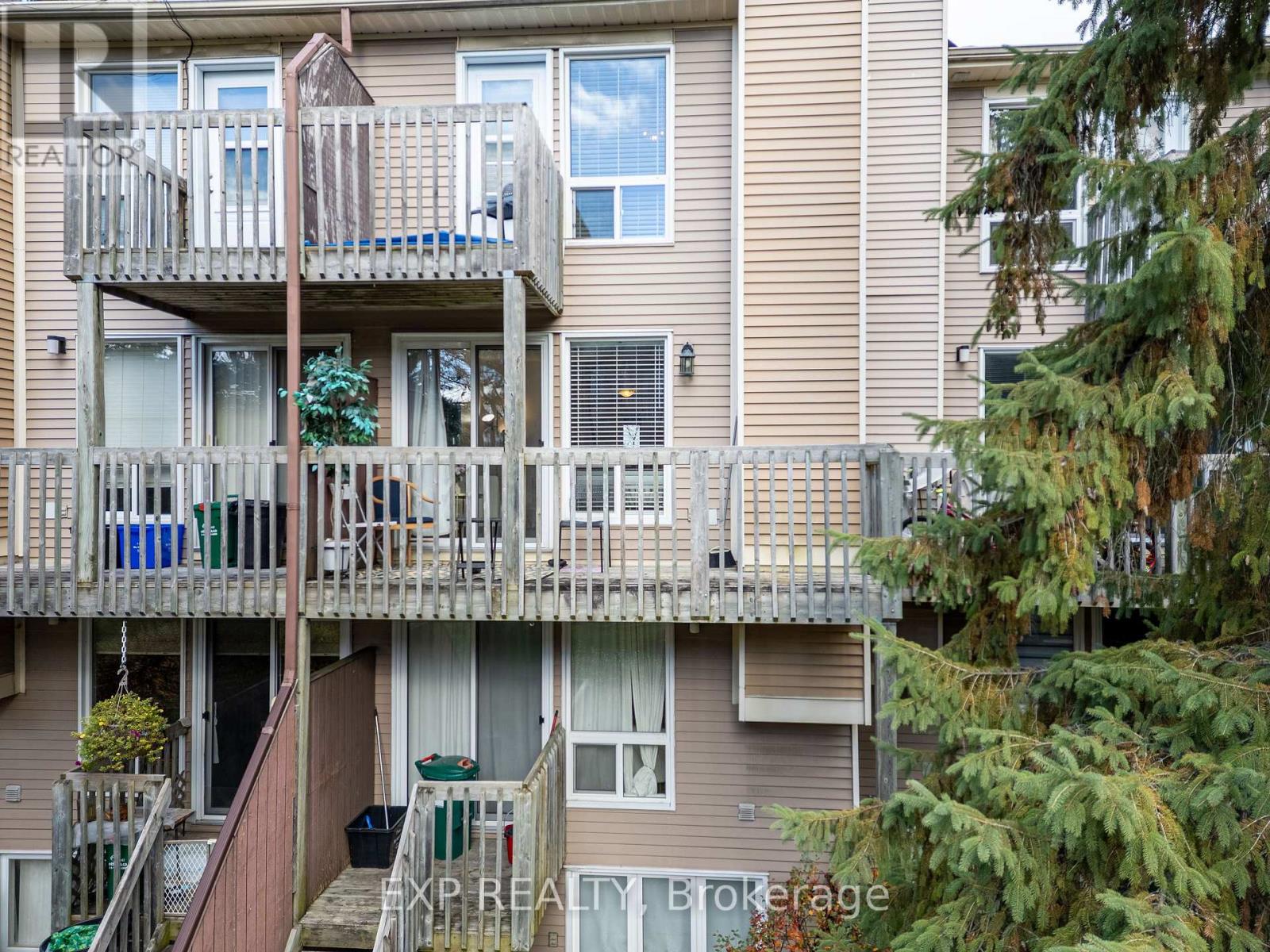 B - 6702 Jeanne D'arc Boulevard N Property Photo 20