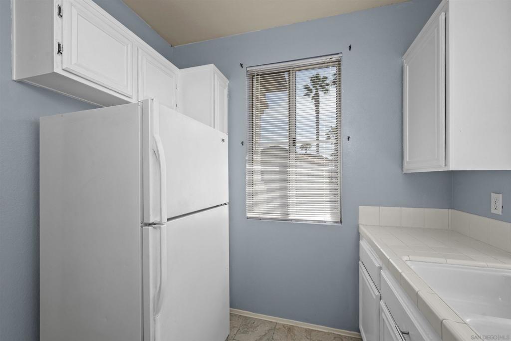 11454 Via Rancho San Diego 208 Property Photo 13