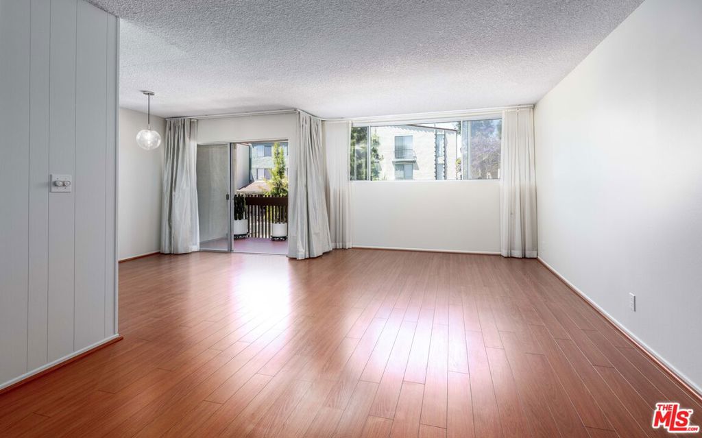 6050 Canterbury Drive E214 Property Photo 1