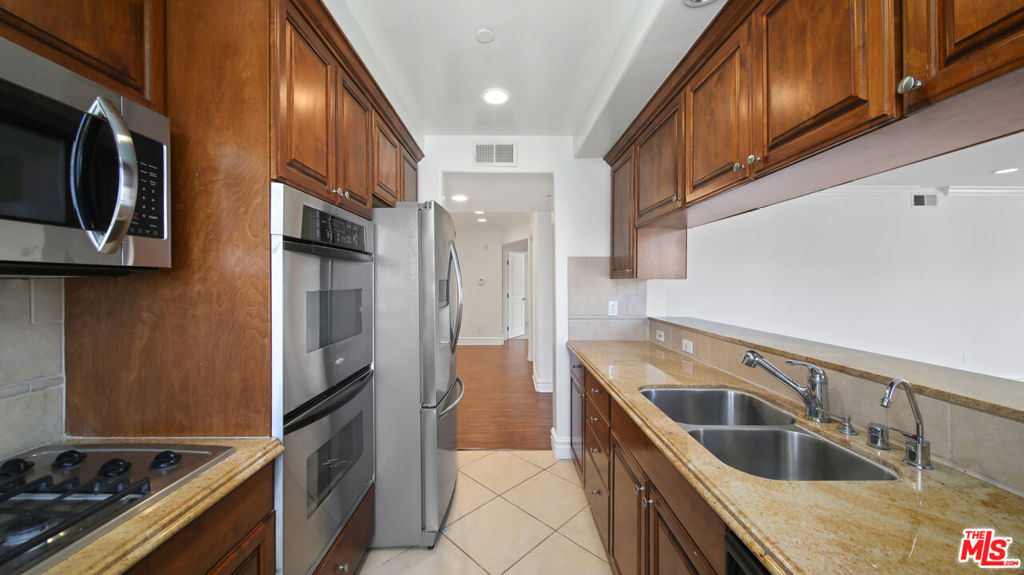8610 CHALMERS Drive 201 Property Photo 1