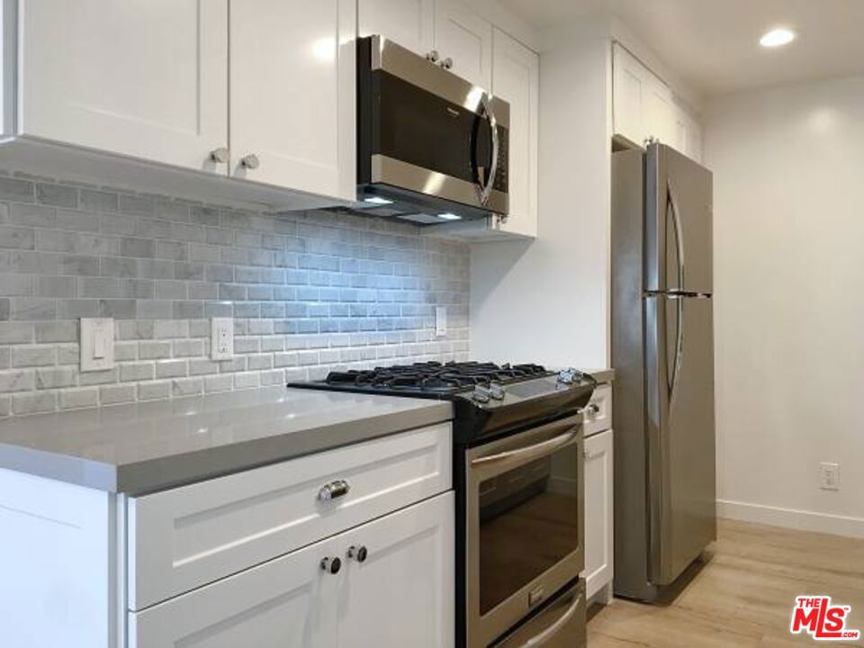 301 S SWALL Drive 203 Property Photo 1