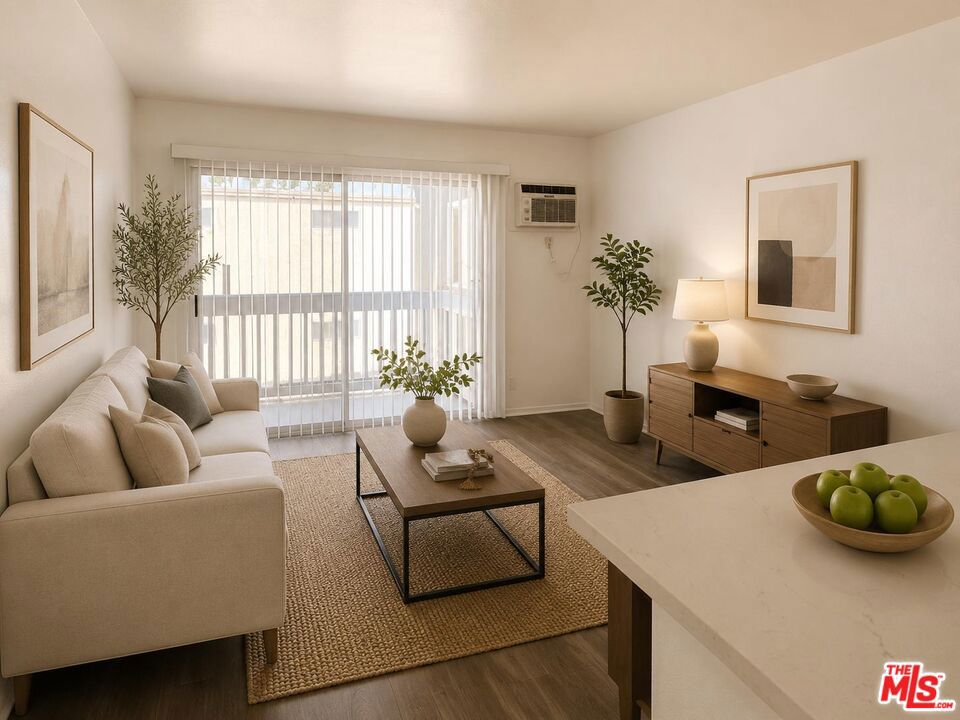 18414 Collins Street 213 Property Photo 1