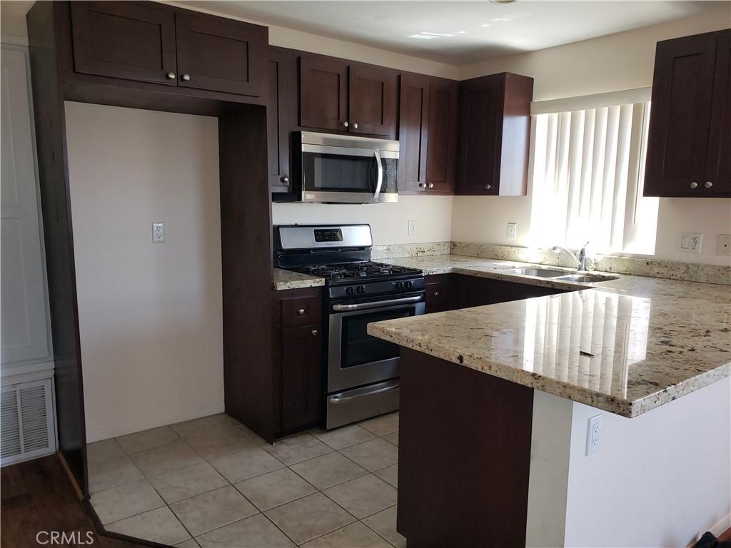 14537 Archwood Street 302 Property Photo 5