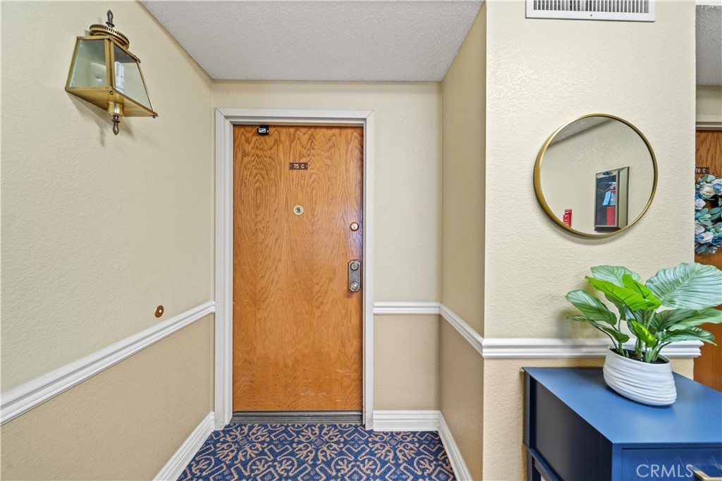 13601 Del Monte Drive 75 Property Photo 1