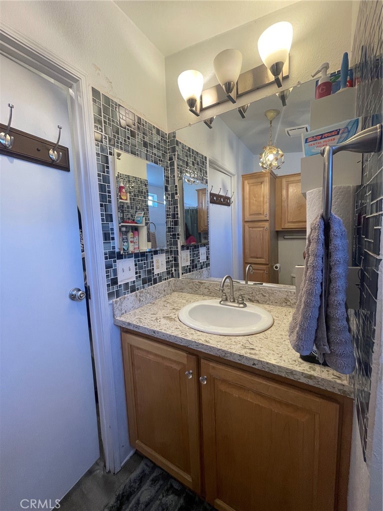 7560 Woodman Place 64 Property Photo 18