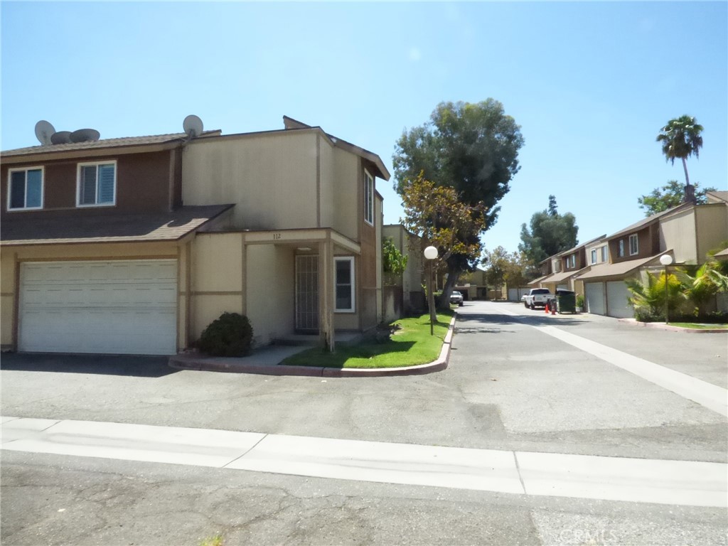 12828 Ramona Boulevard 112 Property Photo 1