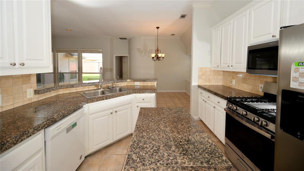 7410 Woodsprings Drive Property Photo 2