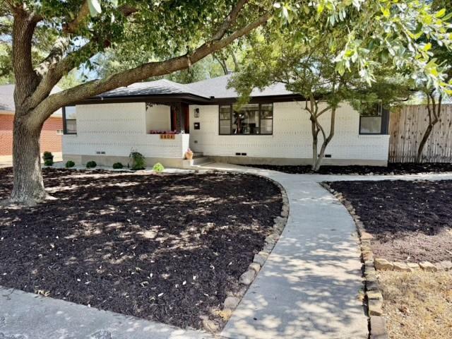 6404 E Lovers Lane Property Photo 1