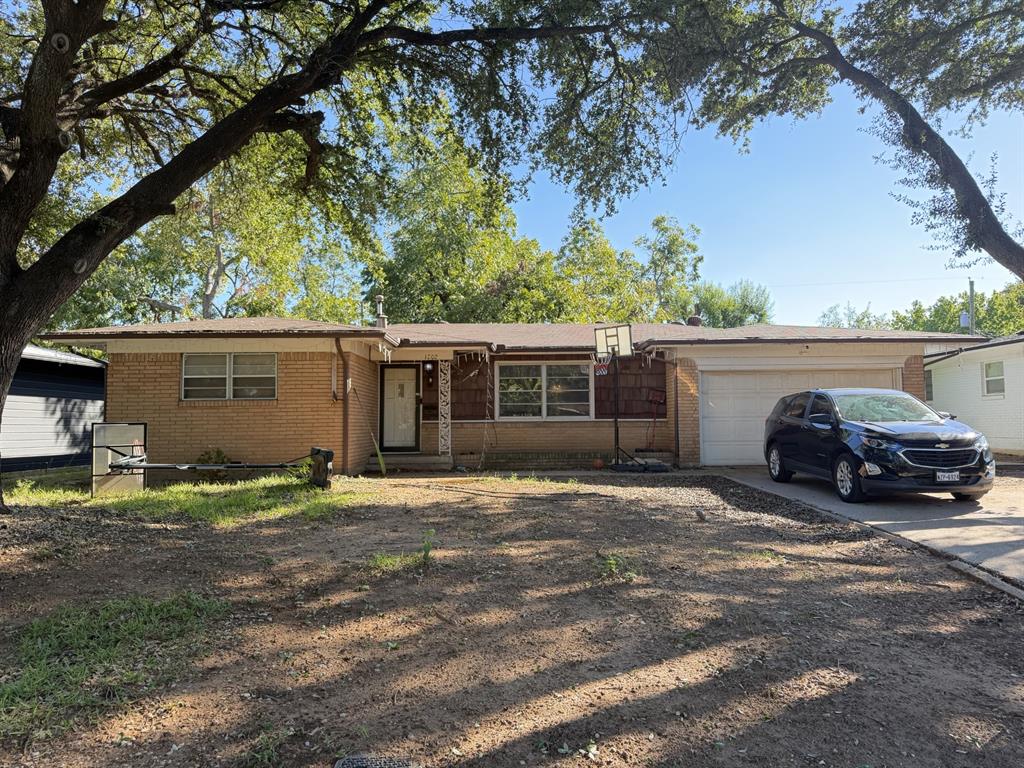 1202 W Tucker Boulevard Property Photo 1