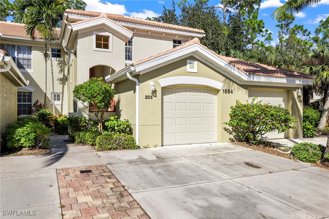 1664 Tarpon Bay Dr S 7-203 Property Photo 1