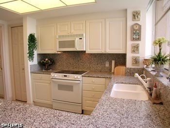 7117 Pelican Bay Blvd 1202 Property Photo 6