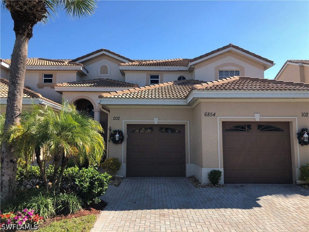 6854 STERLING GREENS DR 201 Property Photo 1