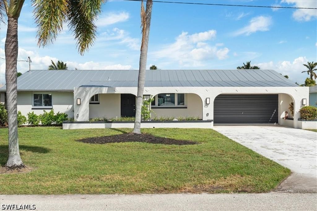 6128 Cocos DR Property Photo 1