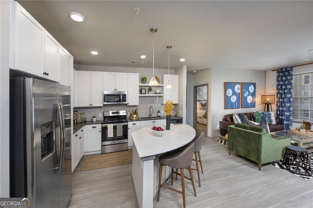 6919 Peachtree Dunwo Road # 405 Property Photo 1
