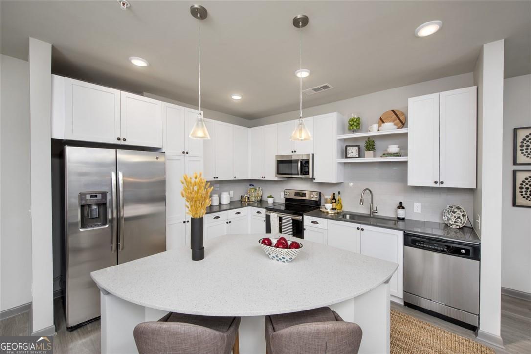 6919 Peachtree Dunwo Road # 405 Property Photo 2