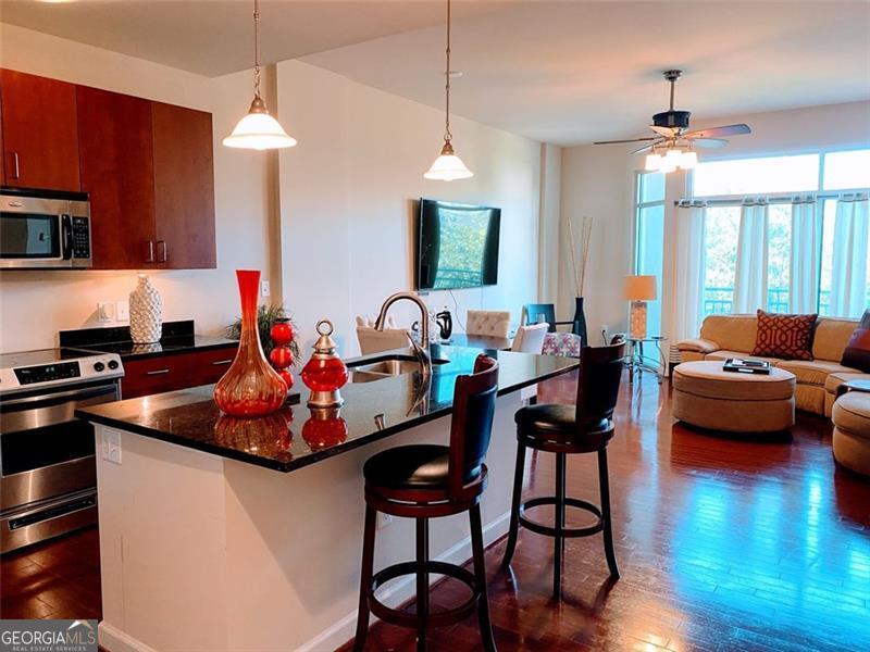 711 Cosmopolitan Drive Ne # 203 Property Photo 1