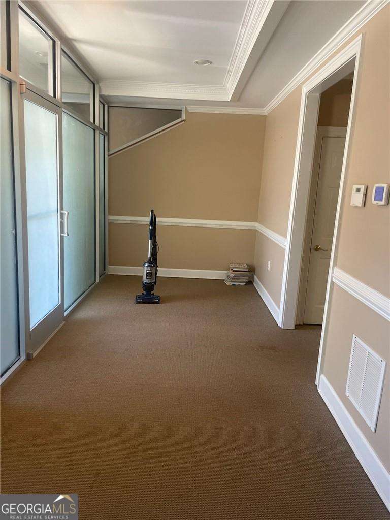5445 McGinnis Village Place # 102 Property Photo 1