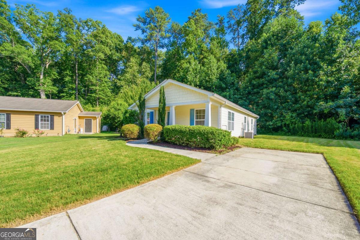 6955 Satterlee Woods Lane Property Photo 1