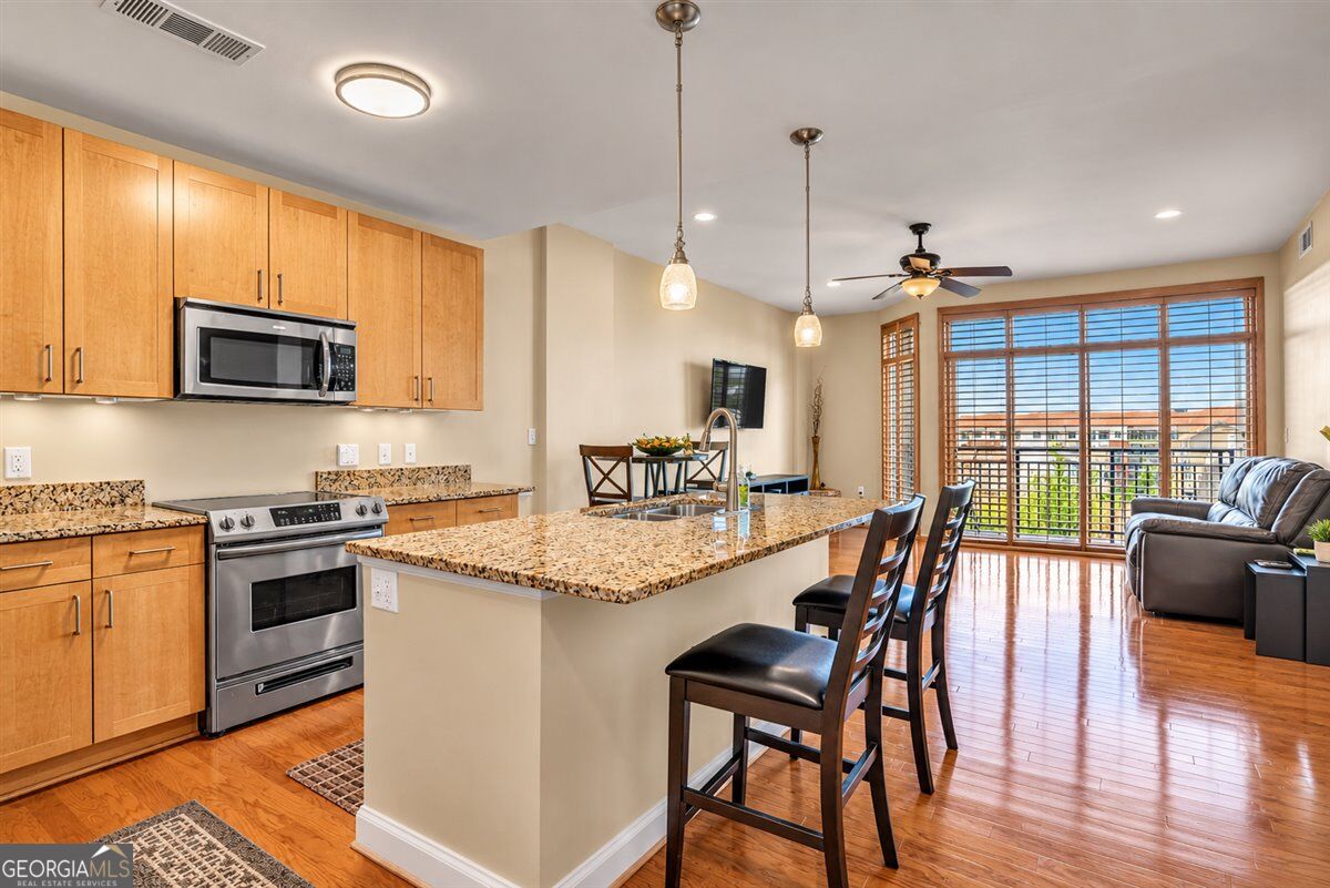 711 Cosmopolitan Drive NE # 403 Property Photo 1
