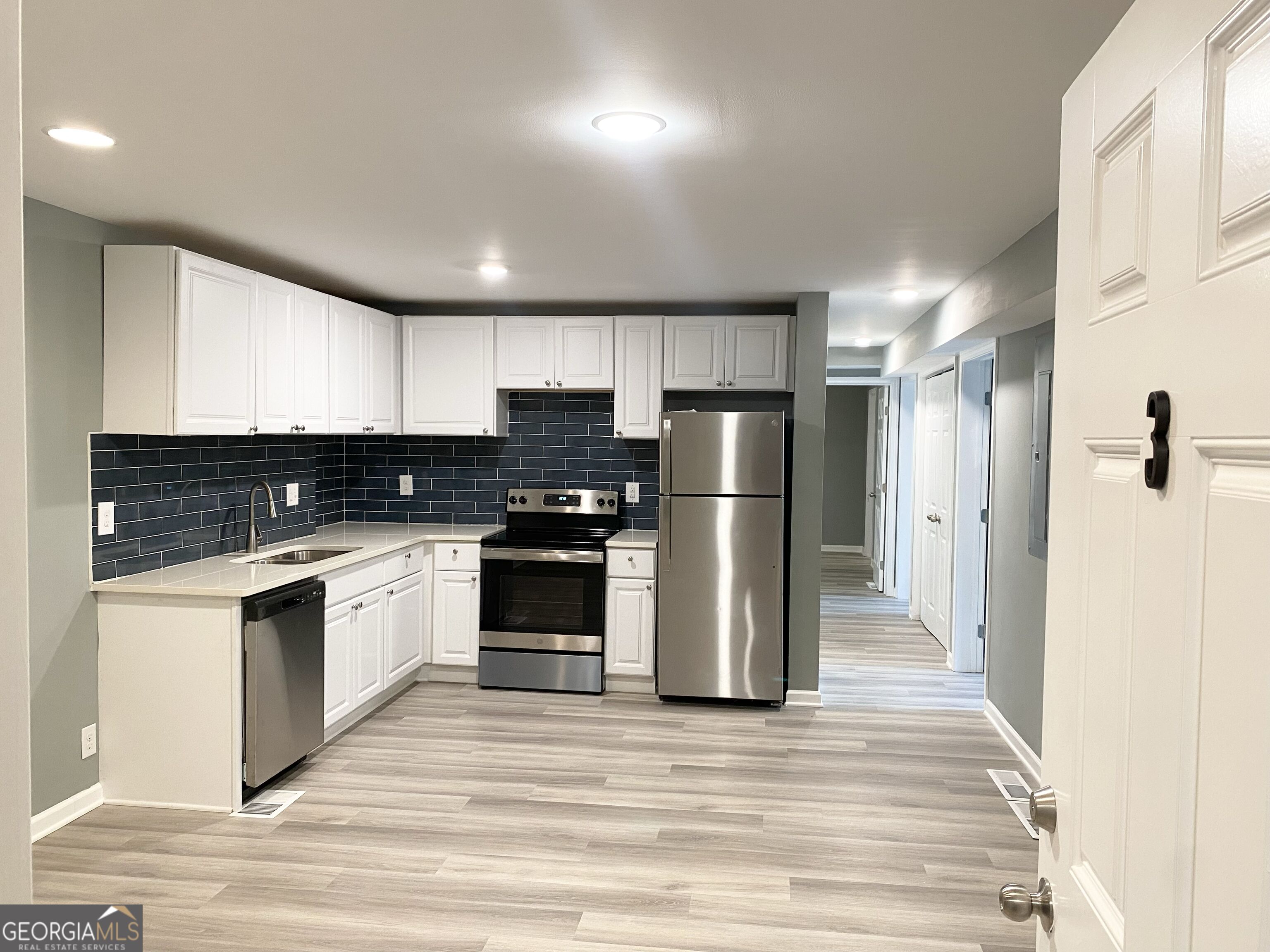 1891 TREMONT Drive NW # 3 Property Photo 1