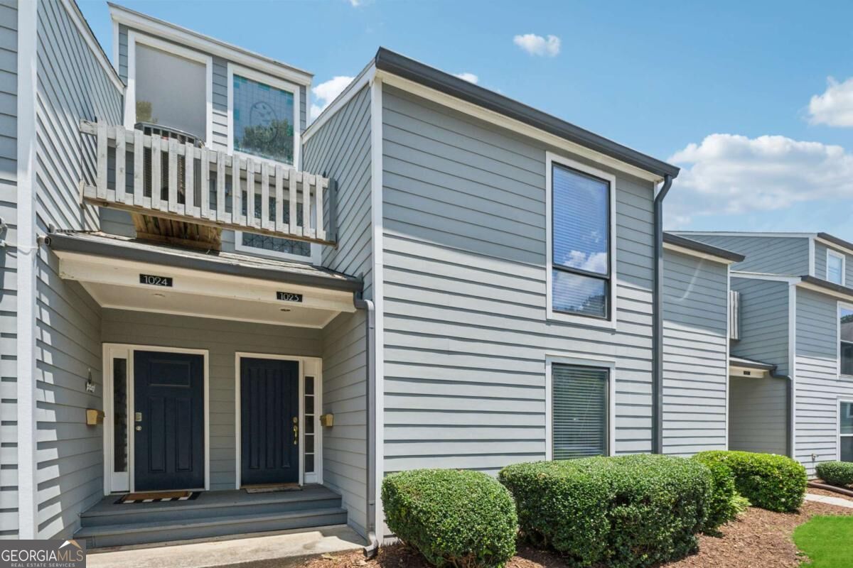 1023 Riverbend Club Drive Se # 23 Property Photo 1