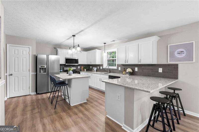 5077 Newpark Drive Nw Property Photo 5