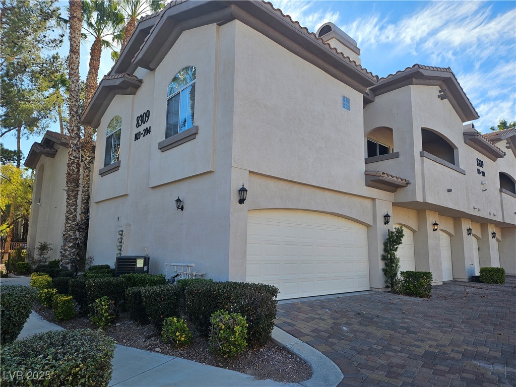 8309 Cherry Glaze Avenue 201 Property Photo 1
