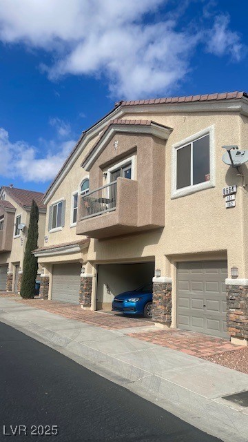 8664 Traveling Breeze Avenue 102 Property Photo 1