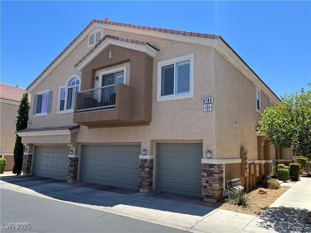 8785 Traveling Breeze Avenue 101 Property Photo 1
