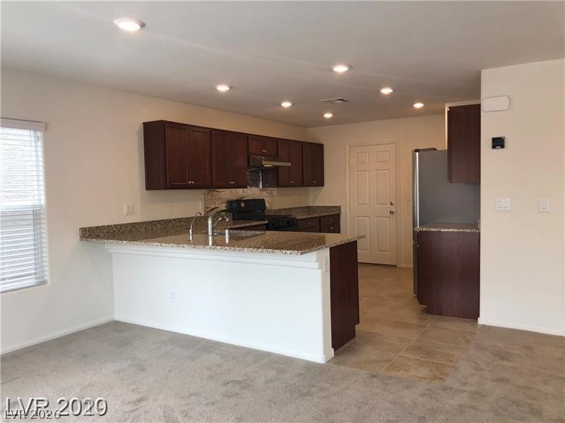 7576 Slipper Orchid Street Property Photo 2