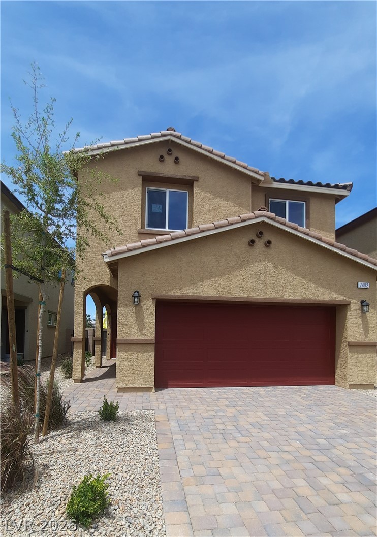 7492 Red Plumeria Avenue Property Photo 1