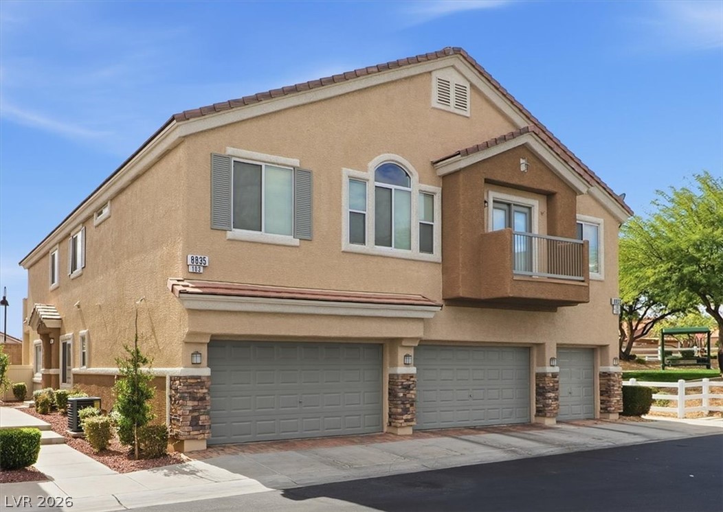 8835 Traveling Breeze Avenue 103 Property Photo 1