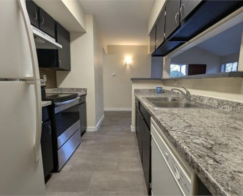 7200 W T C Jester Boulevard 203 Property Photo 3