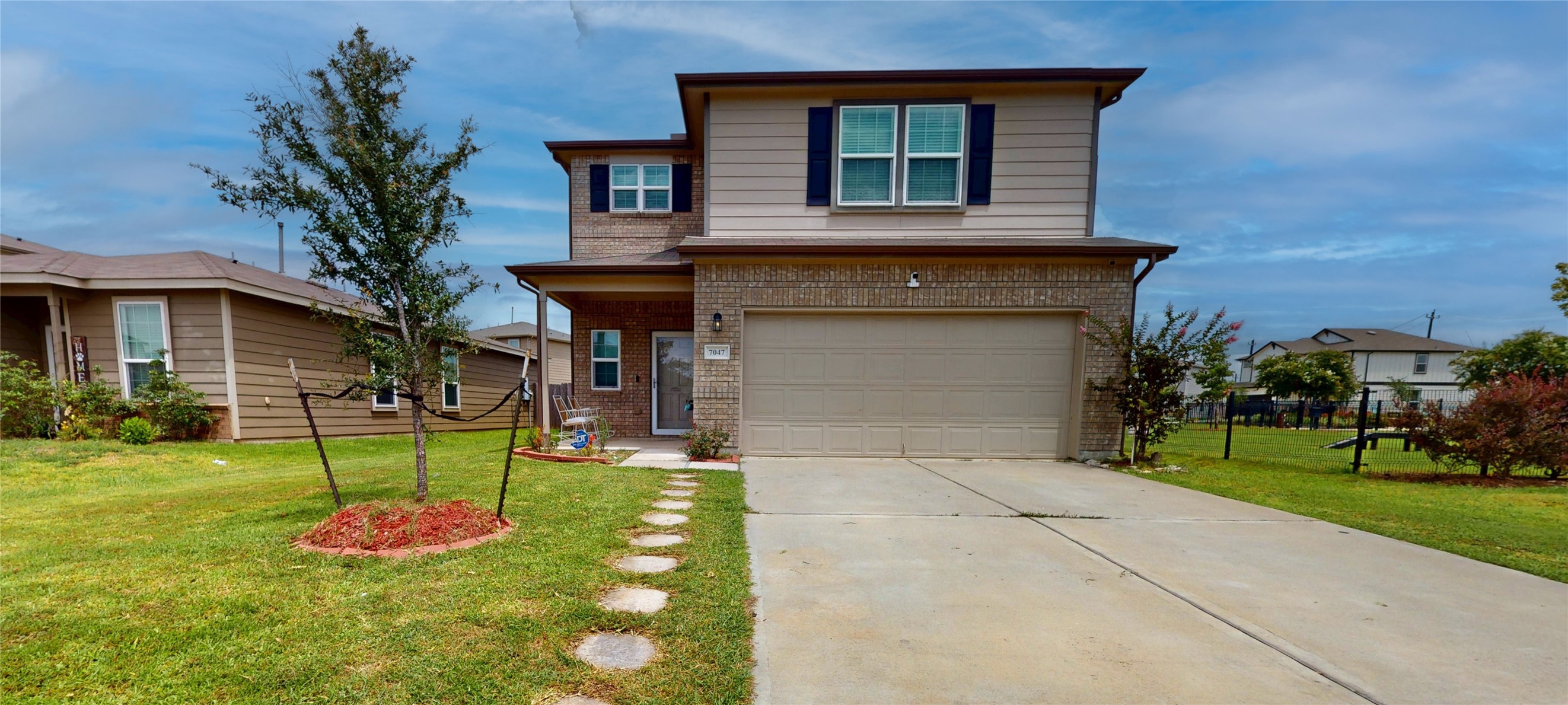 7047 Hobby Wind Ridge Drive Property Photo 1