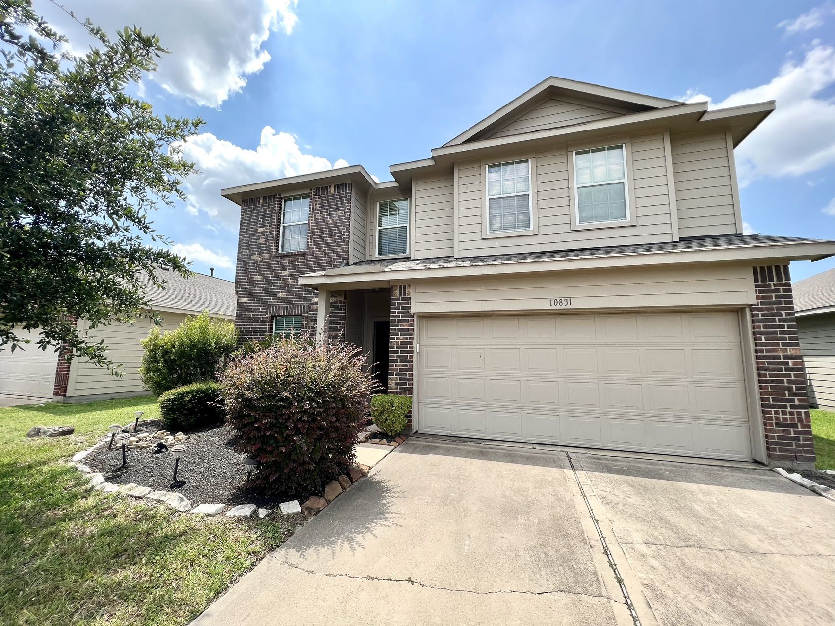 10831 Woodwind Shadows Drive Property Photo 1