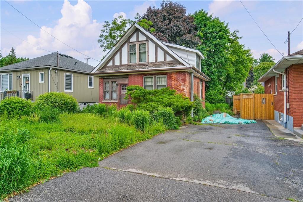 325 Queensdale Avenue E Property Photo 1