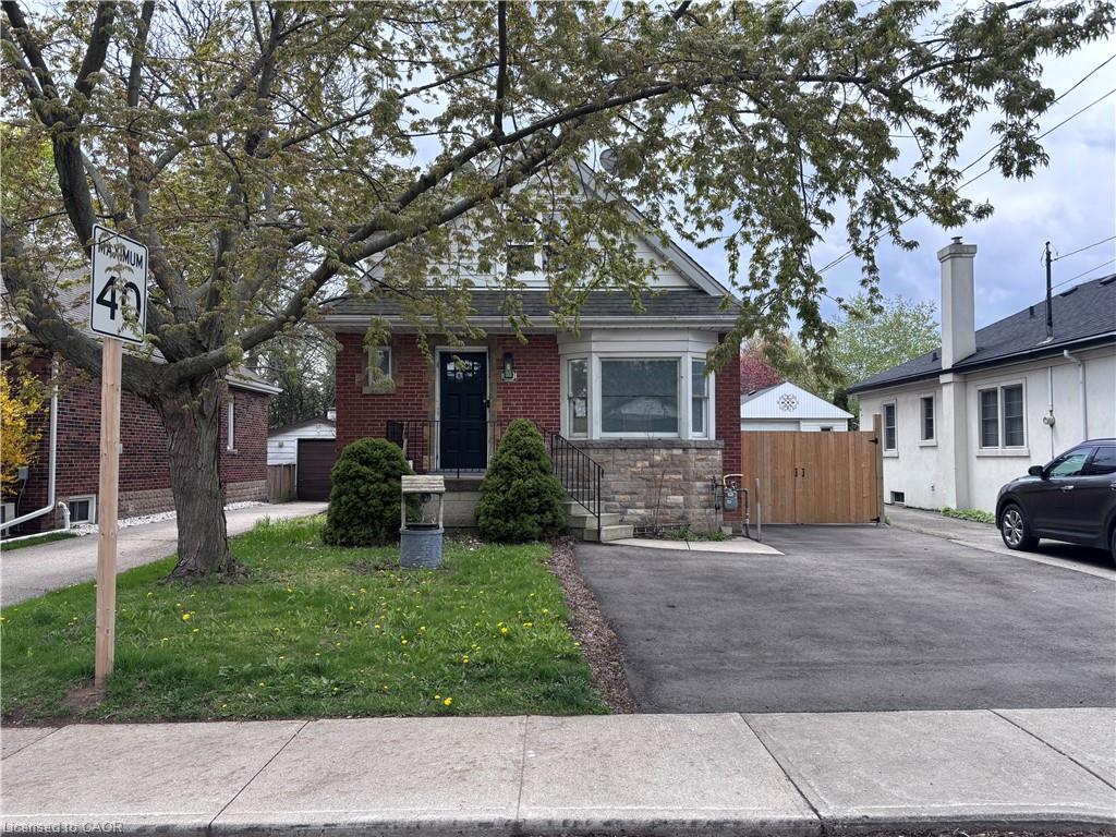 122 Queensdale Avenue E Property Photo 1
